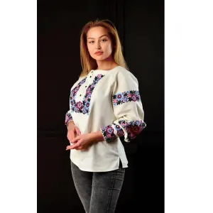Designer women's embroidered blouse with a cashmere jacket