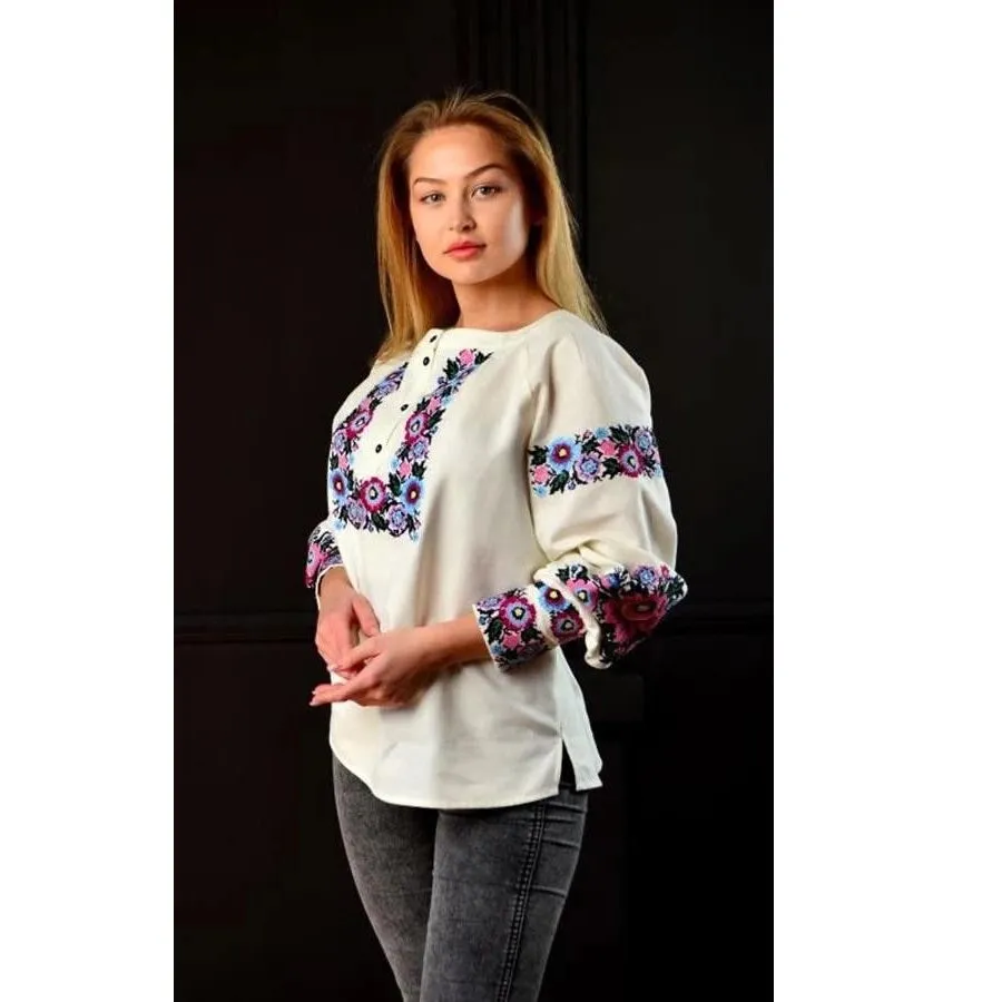 Designer women's embroidered blouse with a cashmere jacket
